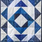 blue and white lap quilt